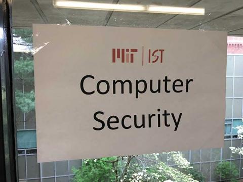Sign on window that reads Computer Security